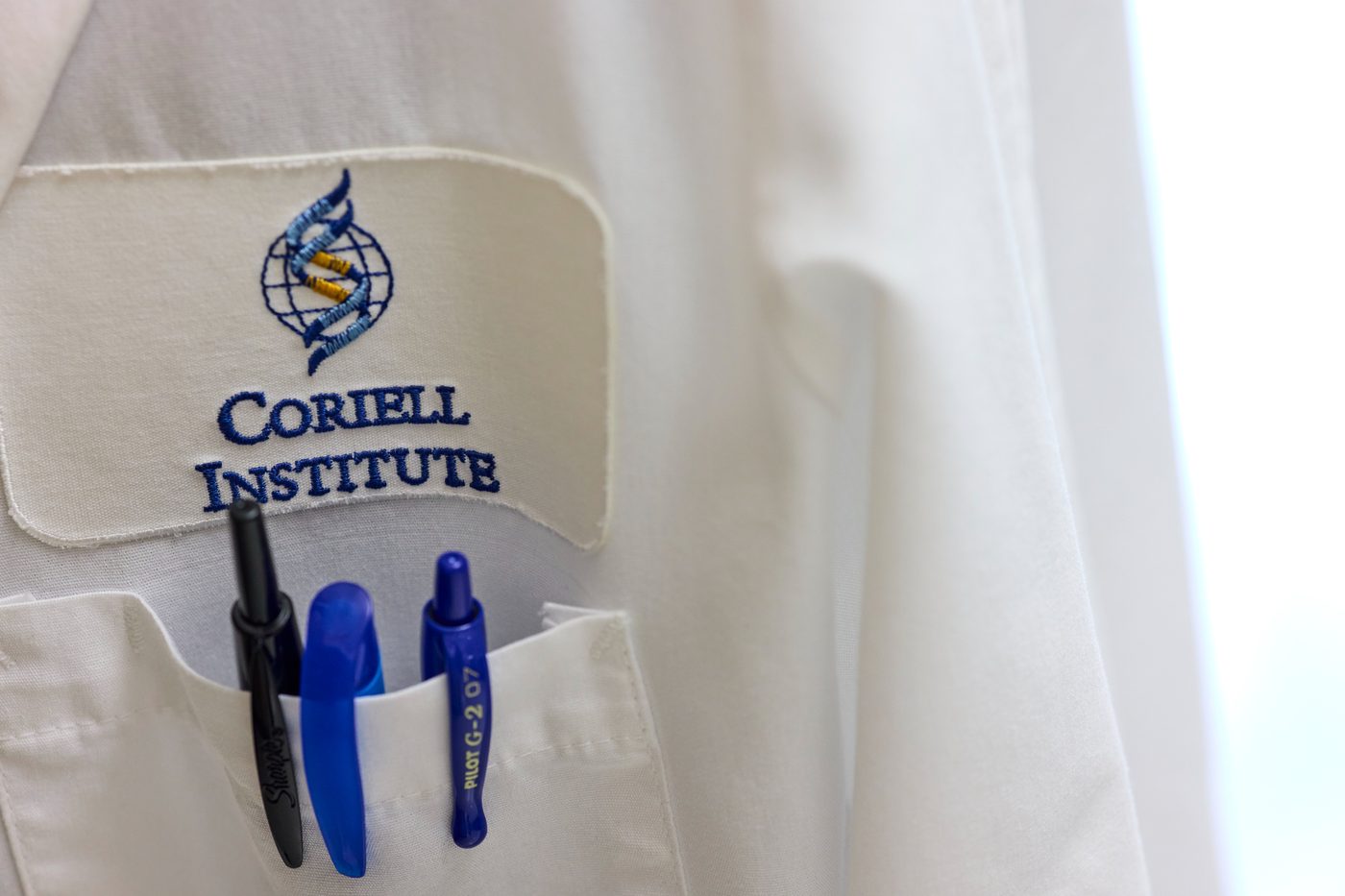 Coriell Institute researcher lab coat with embroidered logo